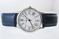 TIFFANY & CO. Elegant Round Stainless Steel Wristwatch on Navy Leather Strap - $3K VALUE APR 57