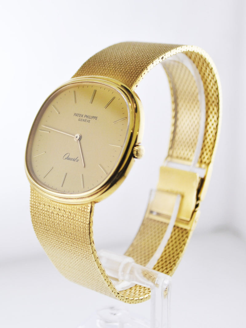 1970's Patek Philippe Oval Men's Wristwatch w/ Original Silk Style Band in 18 Karat Yellow Gold - $50K VALUE APR 57