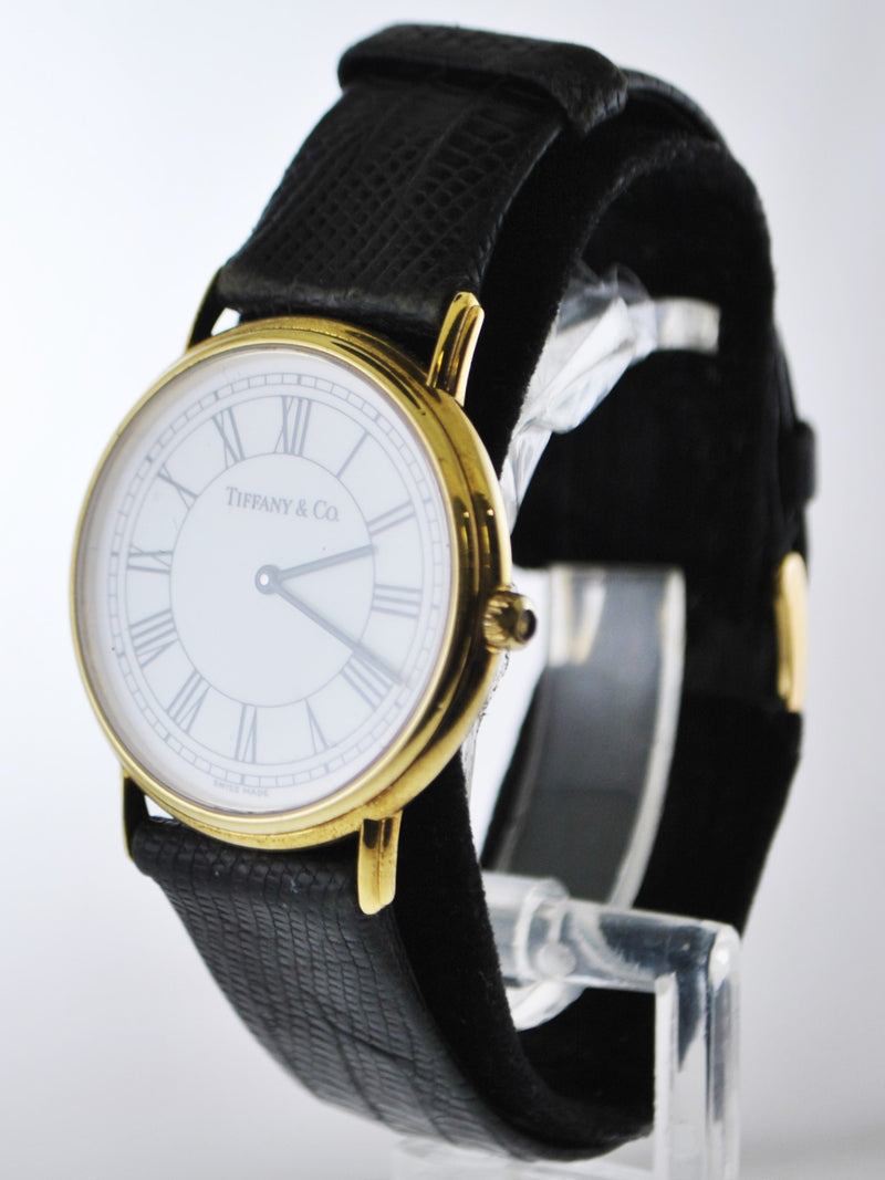 TIFFANY & CO. #M0530 Wristwatch Thin Round Case in 18K Yellow Gold on Black Leather Strap - $6K VALUE APR 57