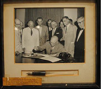 Framed Photograph of President Eisenhower signing Reciprocal Trade Bill with Official Signing Pen - $20K VALUE APR 57